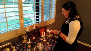 Malkie, from Tennessee, lighting her candles.